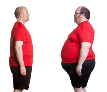 man with big belly staring at flat belly man