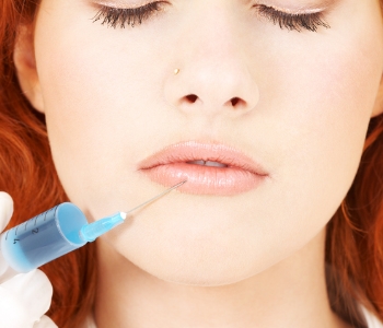 woman lips injected with filler