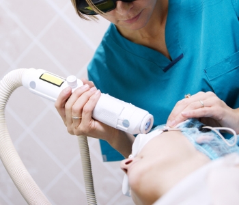 woman getting laser treatment for pore reduction cleveland